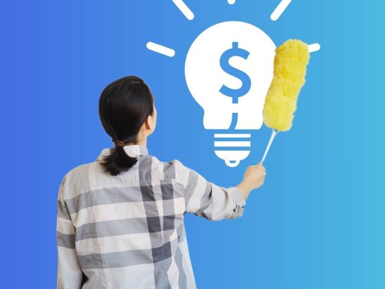 A woman dusts of a lightbulb with the money sign inside it, symbolizing banking basics.