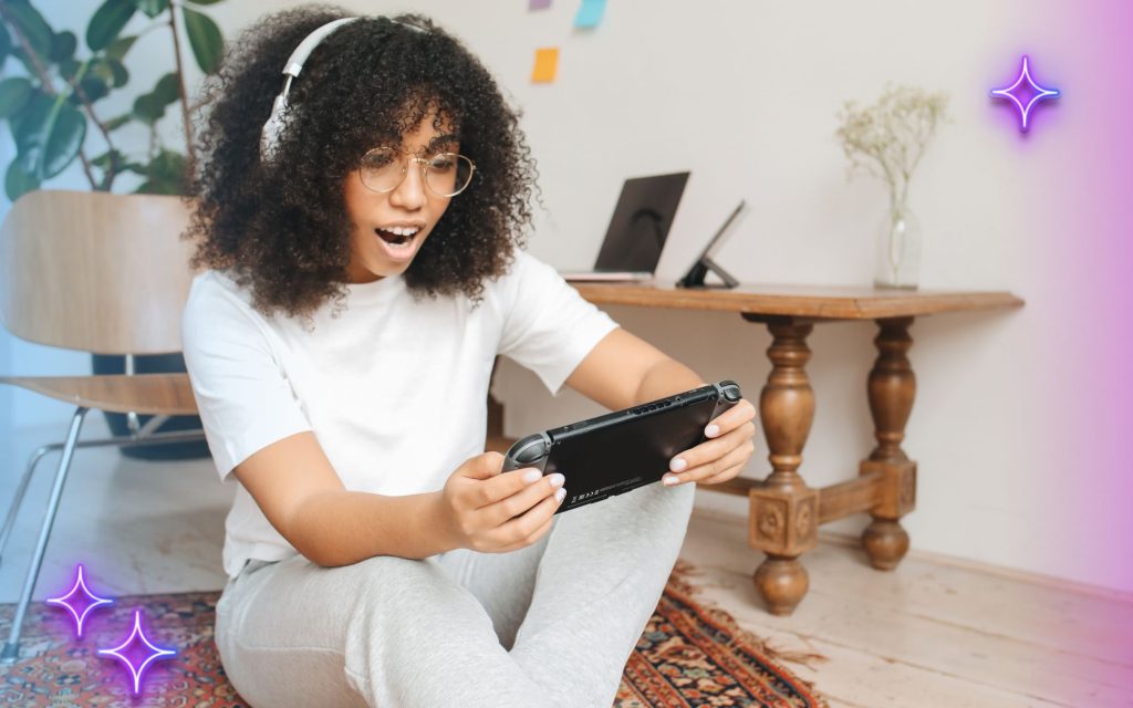 A GenZ female playing games on a Nintendo Switch.